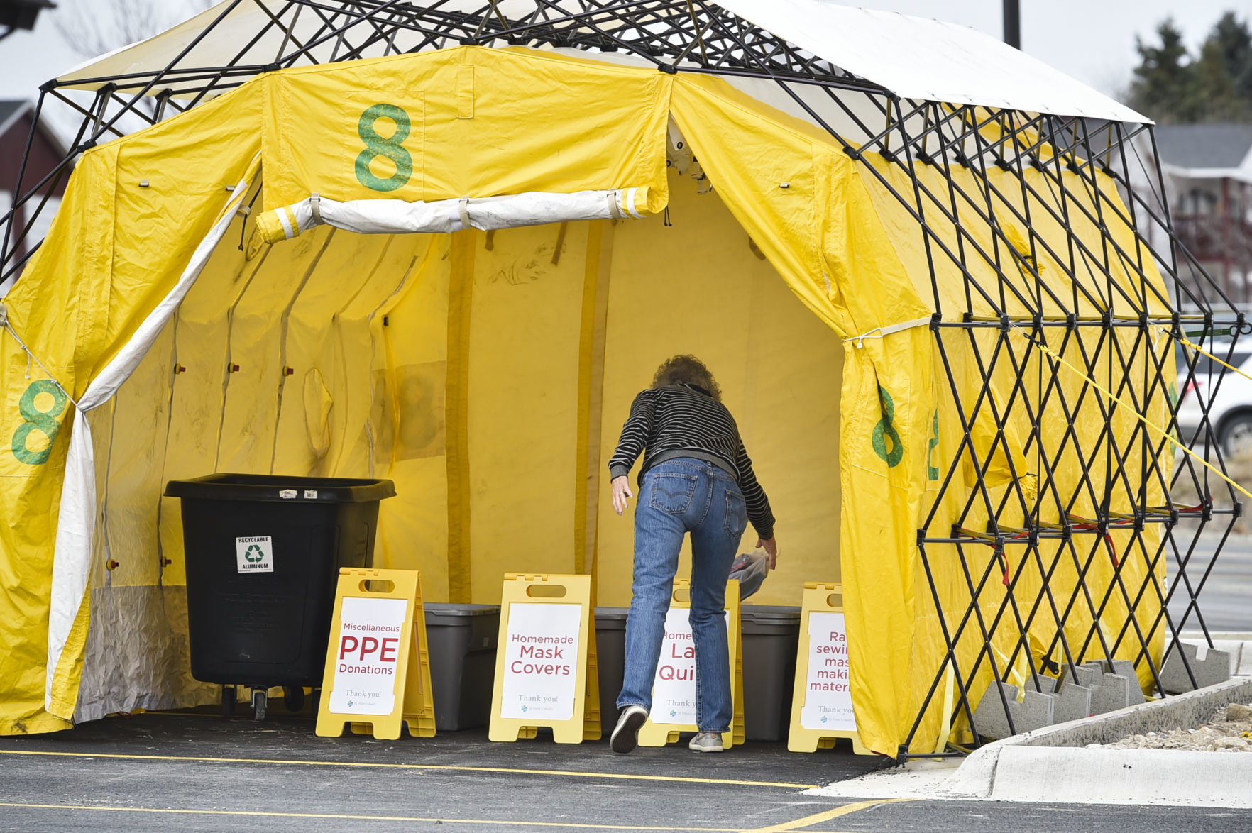 A woman drops off homemade PPE